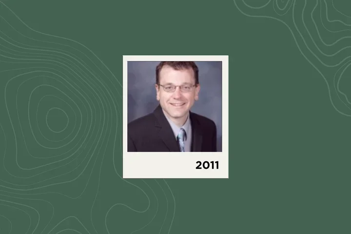 Photograph of Chad Abresch on a green background