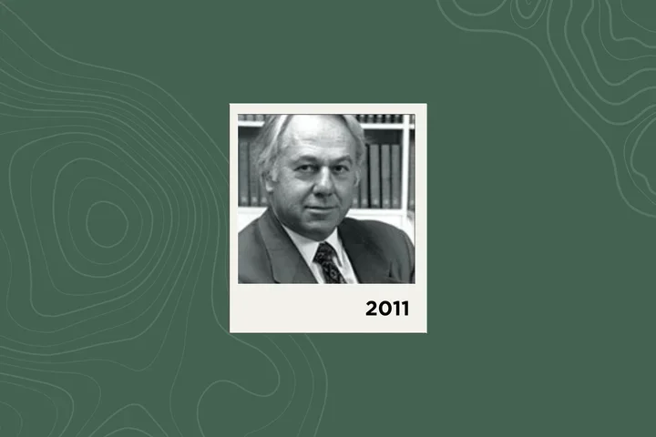 Photograph of David Barker on a green background