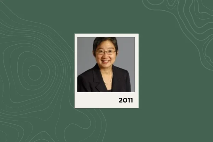 Photograph of Tina Cheng on a green background