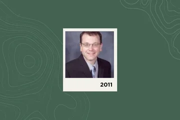 Photograph of Chad Abresch on a green background