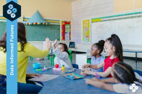 Photograph of children playing in a classroom