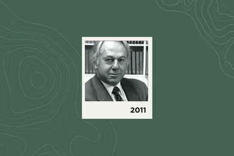 Photograph of David Barker on a green background