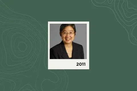 Photograph of Tina Cheng on a green background