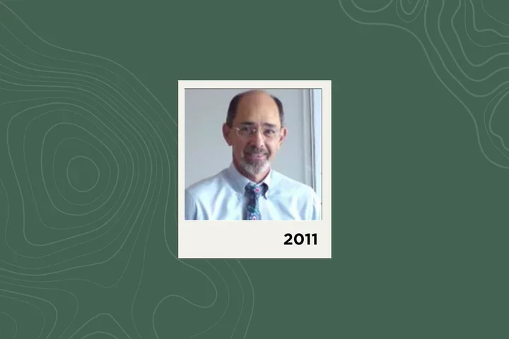 Photograph of Bernard Guyer on a green background