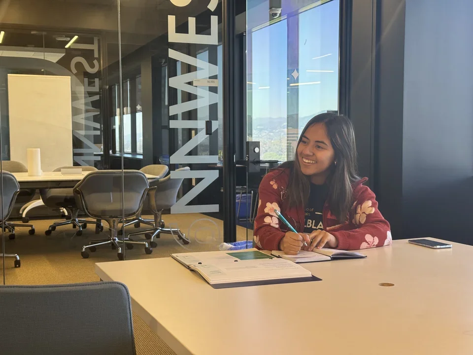 Photograph of interviewer interviewing community member