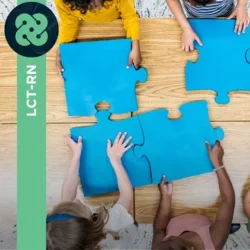 Photograph of 6 kids putting together a giant puzzle.