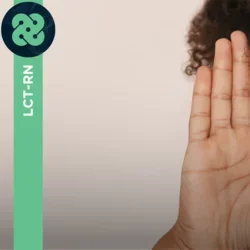 Photograph of person holding their hand to their ear to hear better.