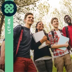 Photograph of five teenagers smiling on a sunny day