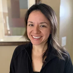 Portrait of Judith (Judy) Perrigo, Research Director.